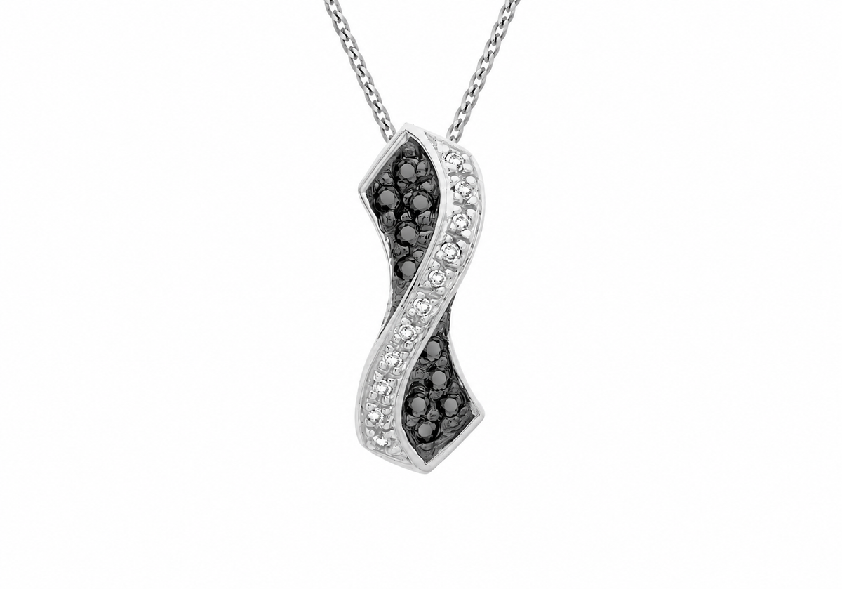A silver wavy pendant necklace featuring black and clear pavé stones, suspended from a silver chain against a plain white background.