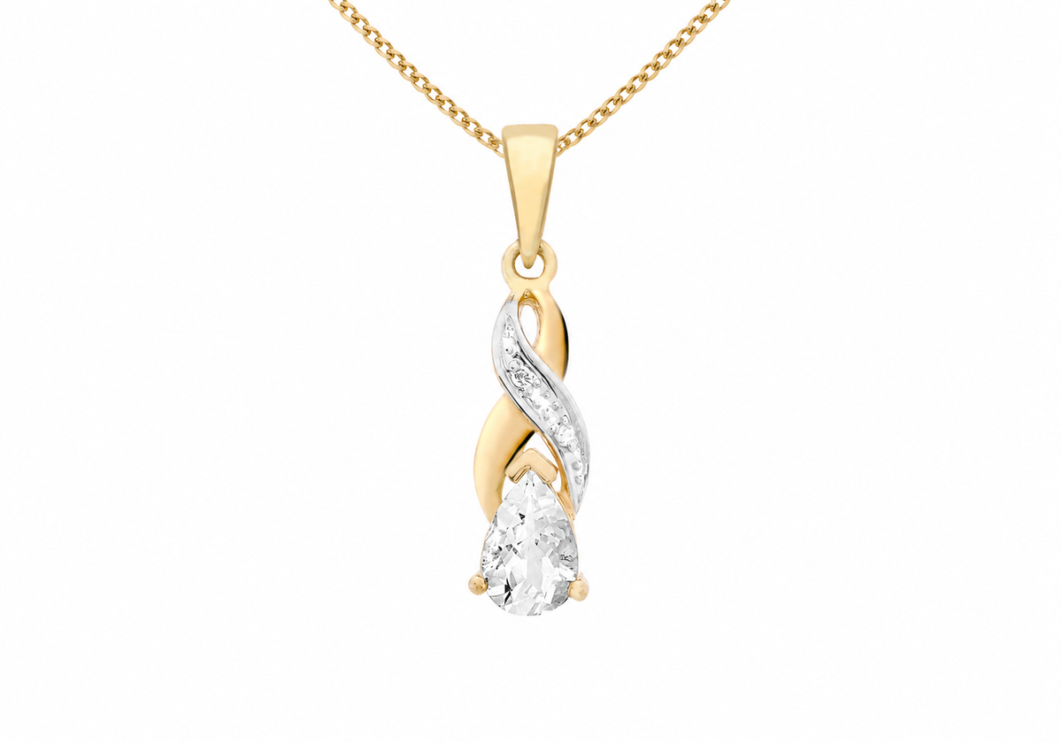 A pear-shaped aquamarine sits beneath two intertwined curves of polished yellow gold. Its faceted surface forms the focal point of the elongated design, held in an open claw setting.
Diamonds totalling 0.01ct follow a contrasting white-metal band through the crossover, adding fine highlights above the aquamarine. The 9ct yellow gold surround flows into a small open loop, with a polished bail completing the pendant.