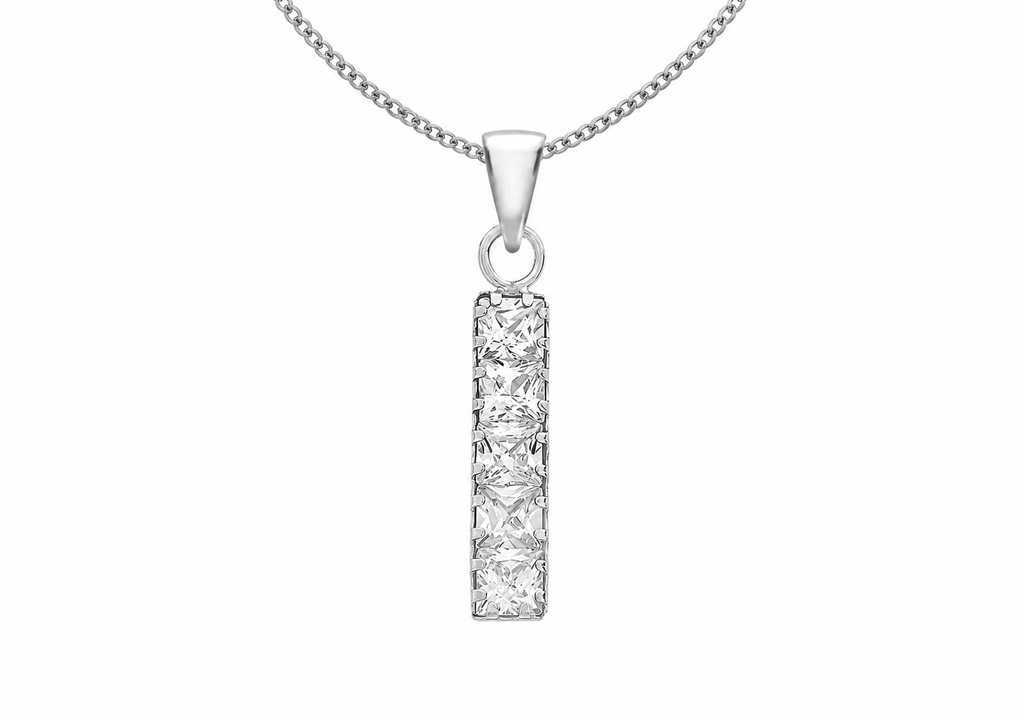 A silver-toned necklace featuring a vertical rectangular pendant set with a row of princess-cut clear stones, suspended from a matching chain against a plain white background.
