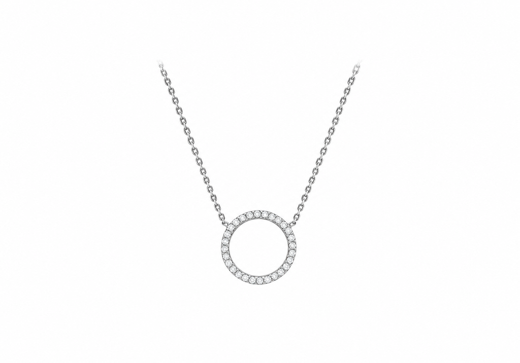 A silver-tone necklace featuring a circular pendant bordered with small clear stones, displayed on a plain white background.