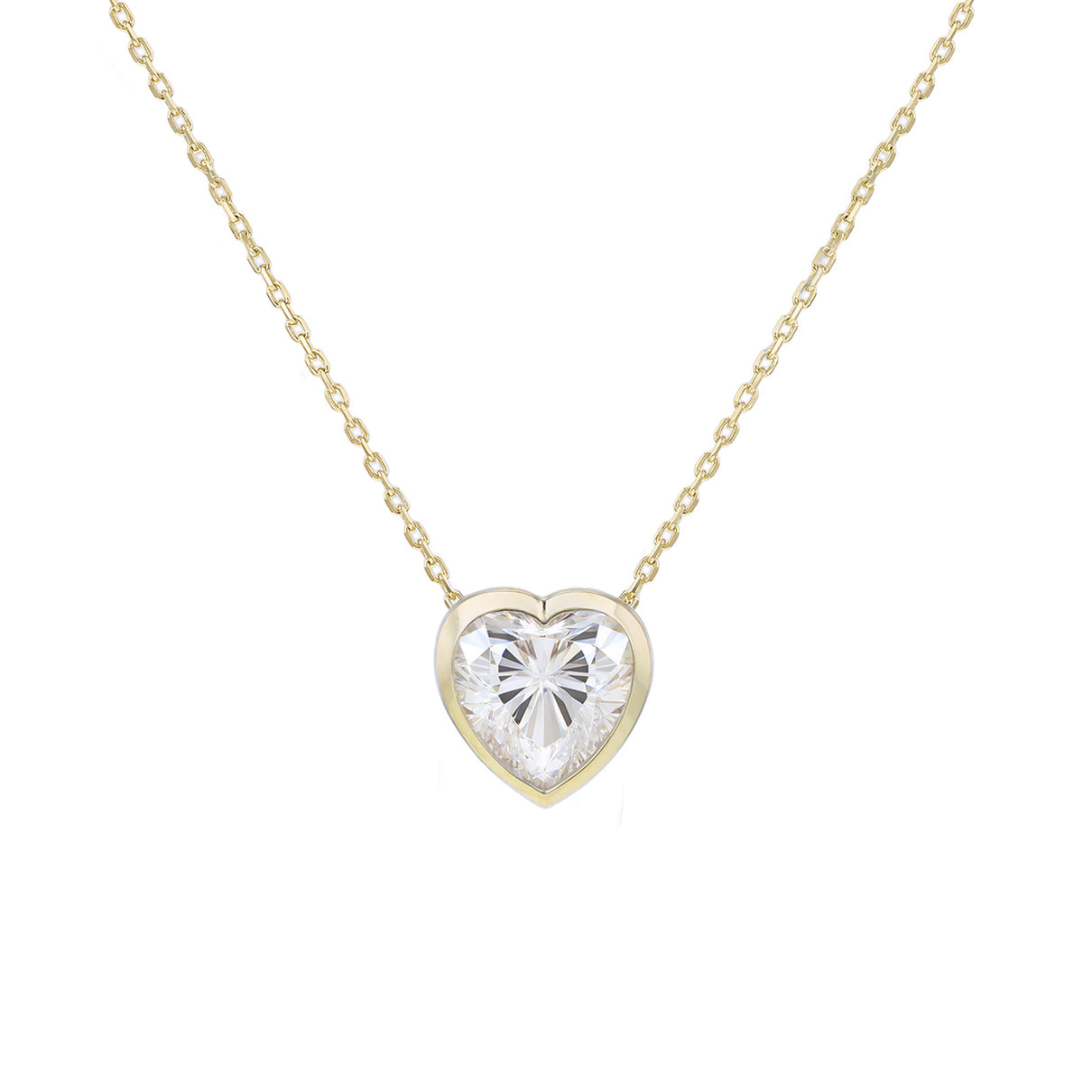A delicate yellow gold chain necklace with a heart-shaped pendant featuring a clear, faceted heart gemstone in a yellow gold bezel setting, shown against a plain white background.