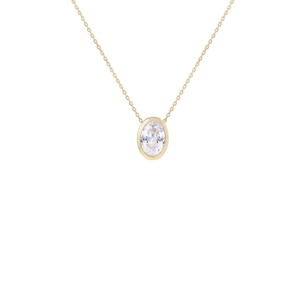 A delicate gold chain necklace with an oval bezel setting holding a clear marquise-cut gemstone, shown against a plain white background.