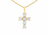 A yellow gold cross pendant necklace with five clear round-cut gemstones, shown on a plain white background.